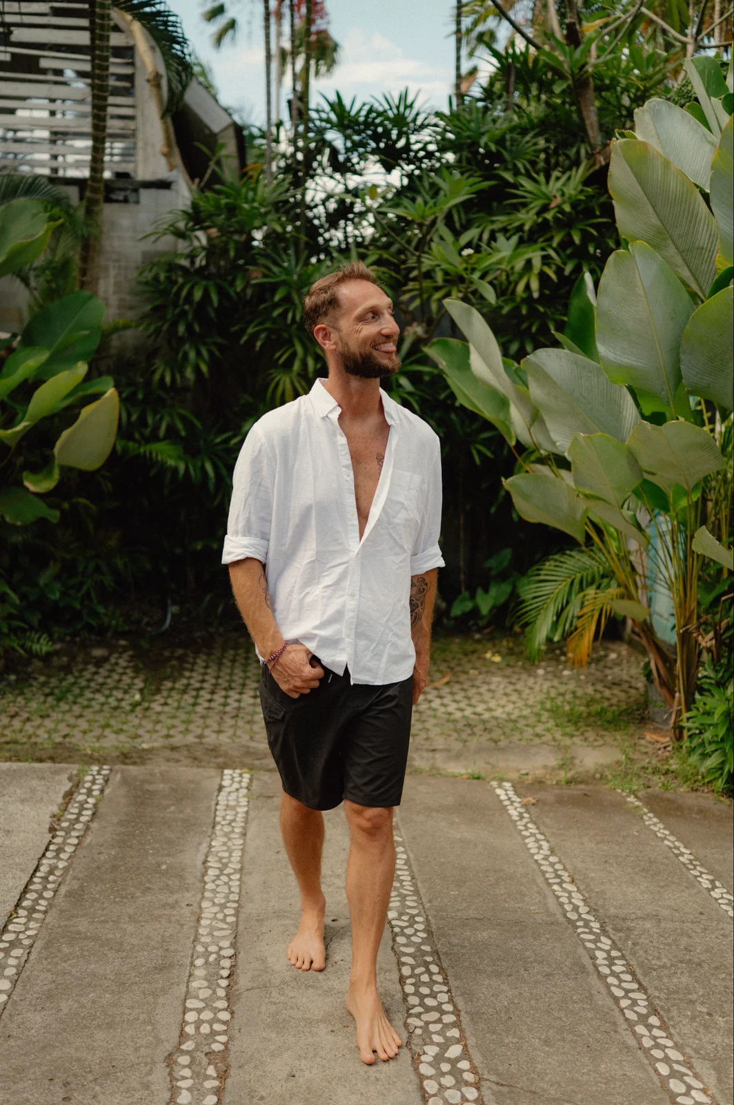 The question isn't usually about them. It's about what you were taught to recognize as love. | Walking barefoot through a tropical garden in Bali, on telling love from habit, Love Unlocked. The question isn't usually about them. It's about what you were taught to recognize as love. | Walking barefoot through a tropical garden in Bali, on telling love from habit, Love Unlocked.